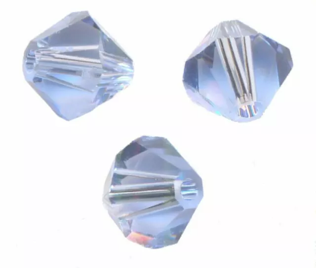 site parisien 20  PERLES TOUPIES SWAROVSKI    5mm   LIGHT SAPPHIRE
