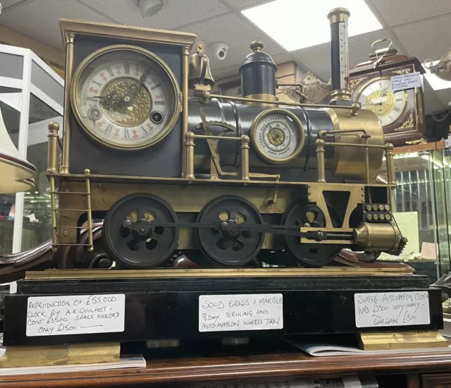 Must sell.  Big Automata Locomotive Clock Heavy Brass On Solid Marble Base