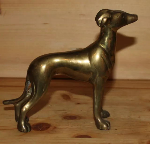 Antique hand made brass hunting dog figurine