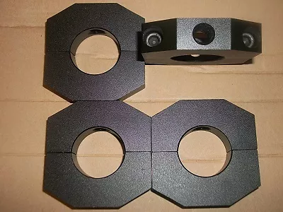 Qty of 4..... 1-1/2 inch alum round weight clamps.. late models ...