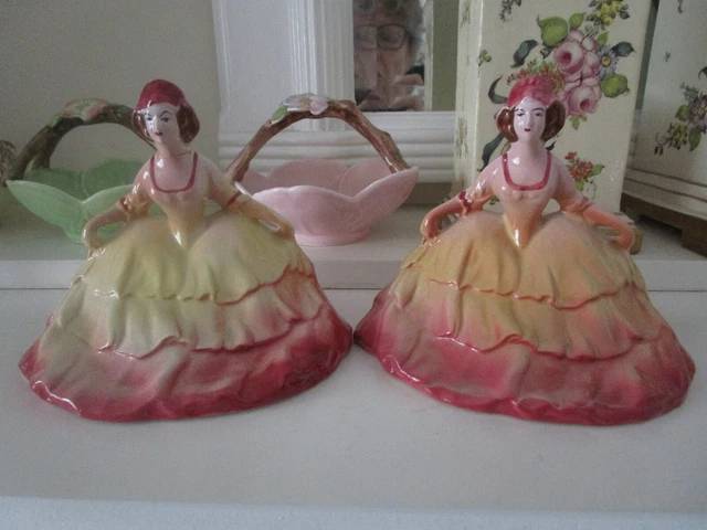 A Pair Of Ceramic Hand Painted Crinolne Lady Figurines