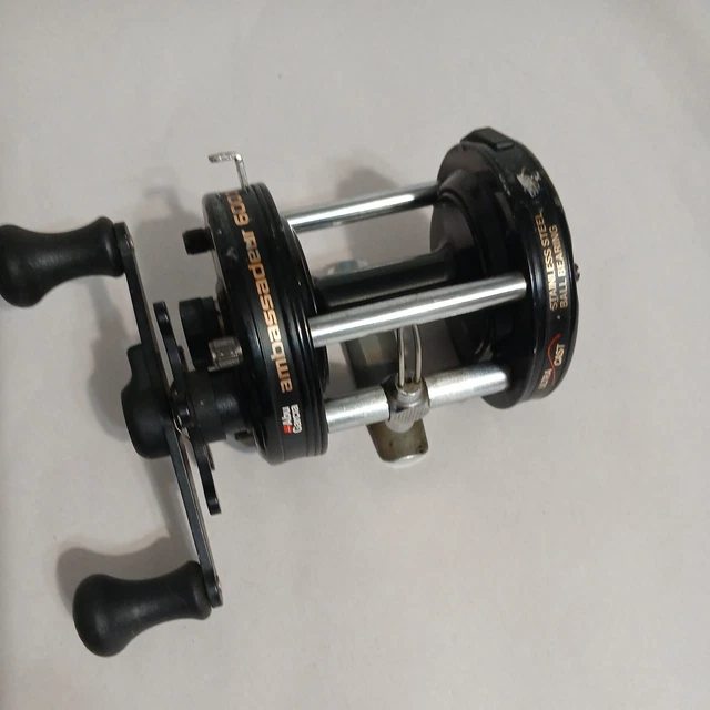 AMBASSADOR 6000C FISHING REEL black gold lettering $52.03 AMBASSADOR 6000C FISHING REEL black gold lettering $52.03