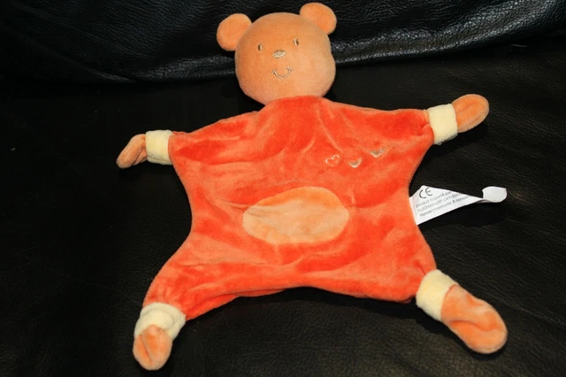 Doudou peluche plat ours orange et jaune AUCHAN brodé coeur blanc