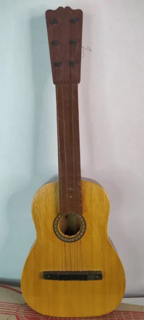 Small Vintage Wooden Toy Guitar. See Photos For Complete Details