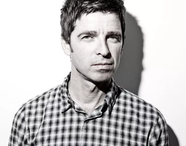 Oasis Unsigned photo - Noel Gallagher - Donation to Cancer Charity *8