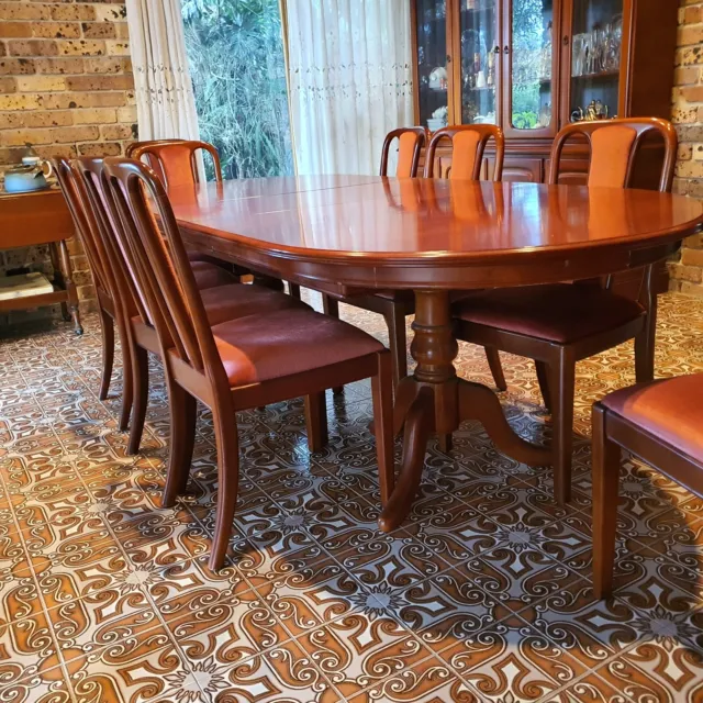 dining table, can be extended to seat 12. Includes 12 chairs and buffets. Used