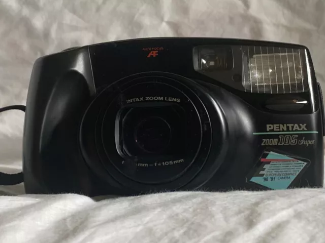 Pentax Zoom 105 Super, 35mm film camera. Good condition   -  *Shutter seized