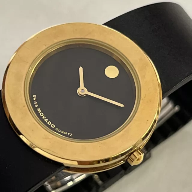 womens Movado Gold Casing Black Dial, 87-49-831, Pre Owned Runnung New Battery