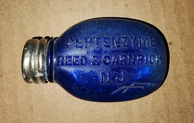 Reed & Carnrick Peptenzyme Cobalt Blue Medicine Bottle with Tin Lid