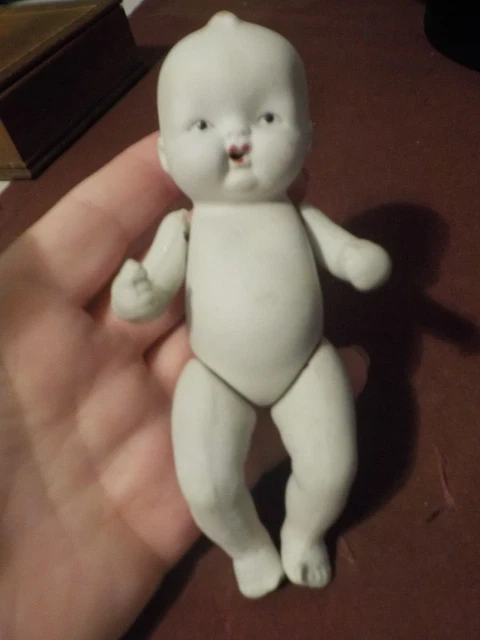 Antique Bisque Doll Made In Japan- Baby With Red Lips Tuft Brown Hair