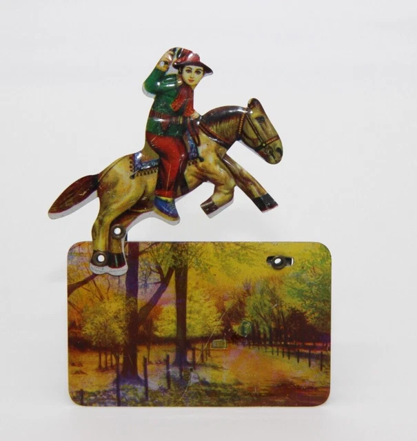 VINTAGE TIN LITHO Clicker Noisemaker Horse W/ Rider Woods Path Scene