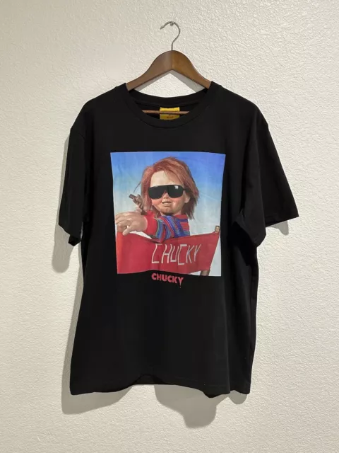 CHUCKY X SHOE PALACE Shirt Adult Large Black “Chucky in Directors Chair Tee"