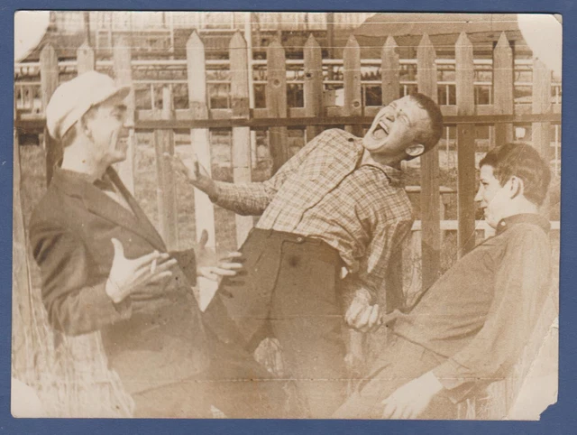 Handsome Guys smoking cigarettes and laughing merrily Vintage photo