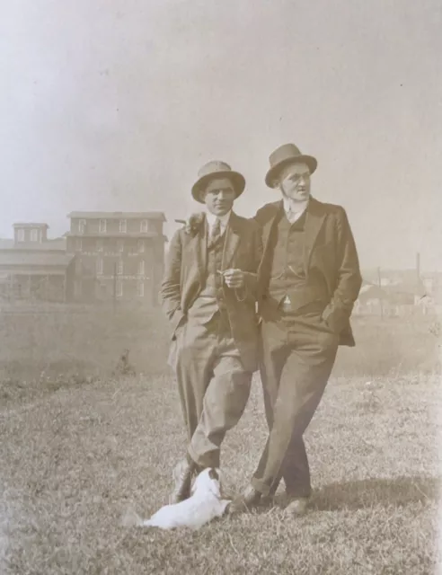 RPPC Two Young Affectionate Men Smoke Cigar Puppy Dog  Photo Postcard VTG 1900’s