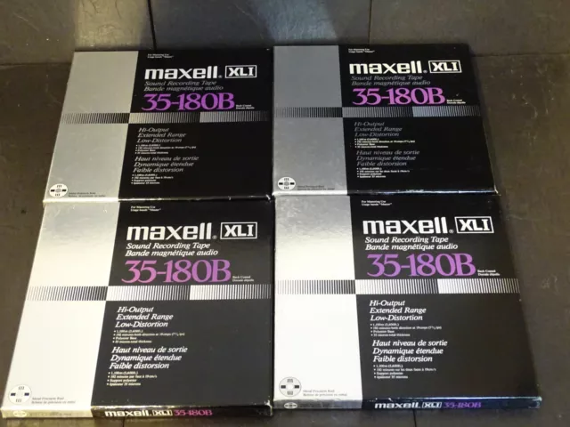 MAXELL METALLSPULEN 4x 26,5cm  MIT BANDMATERIAL  4 PIECES