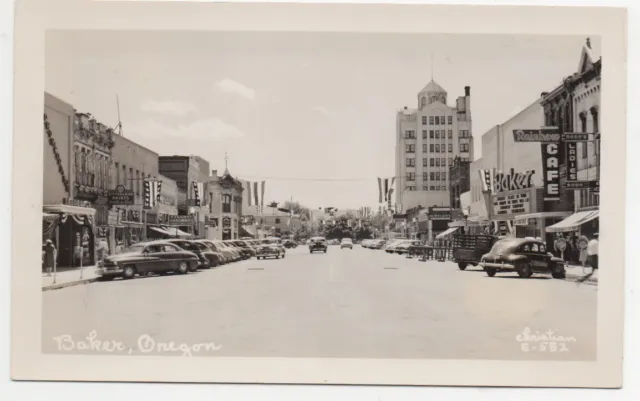 1940s RPPC Postcard showing Street Scene with Autos in Baker Oregon