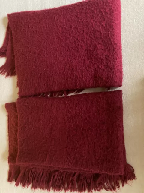two 'Oka' rugs/throws in a lovely deep red colour size 51 x 67 inches in good co