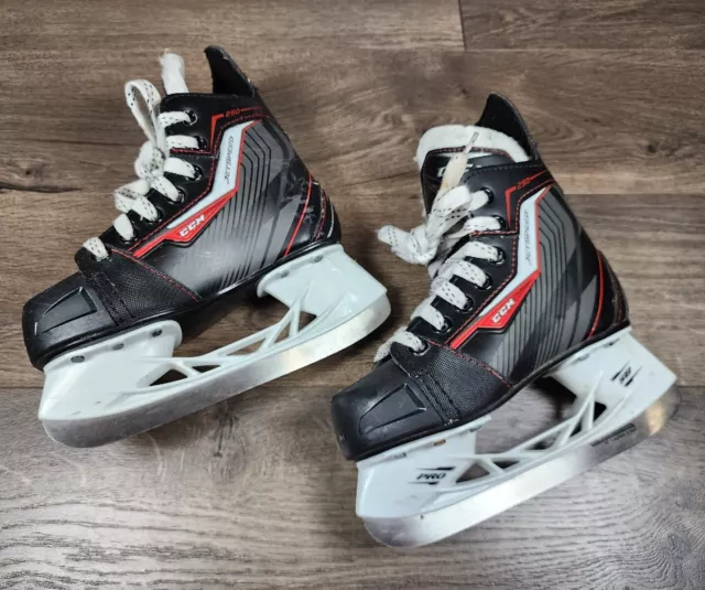 CCM Jet Speed 250 Ice Hockey Skates junior Size 12 J Blade Black And Red