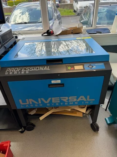 Universal PL 4.60 laser cutter machine, in good working order comes with Filter