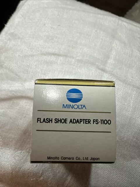 Adaptador de zapata caliente unidad de flash Minolta FS-1100 muy limpio con caja original