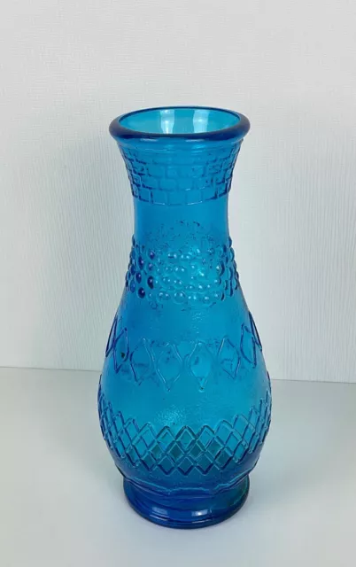 Vase avec fleurs et entrelacs bleus (peinture sur verre