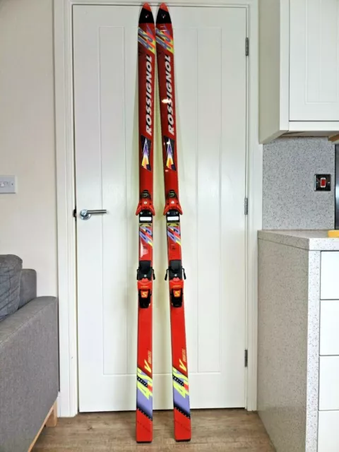 Pair Vintage Rossignol 4S V Skis with Salomon Equipe Driver 877 Bindings