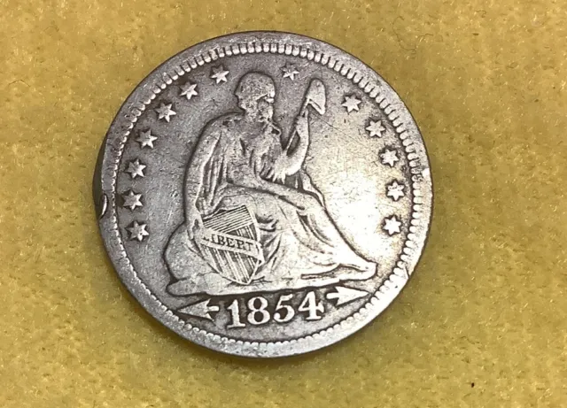 1854 seated liberty quarter with arrows At The Date .