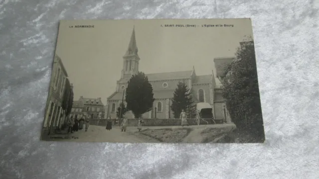 CPA carte postale village Saint-Paul Orne Eglise et le Bourg animé