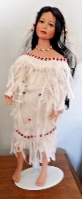 Native American  18"  Porcelain Doll  on stand and vinyl doll cover