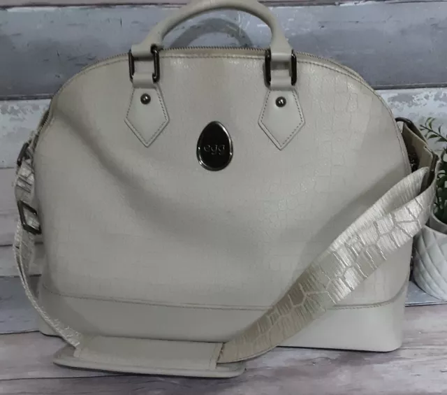 Egg jurassic cream clearance changing bag