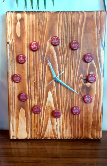 Handmade wall clock made from reclaimed pallet wood, bottle cap clock