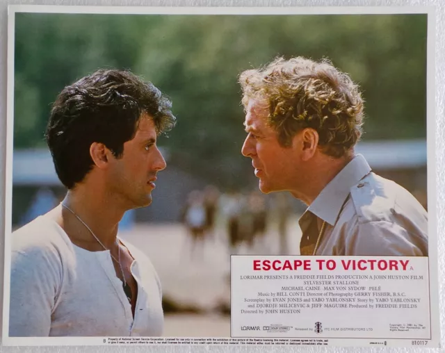 ORIGINAL 1981 LOBBY CARD 14 x 11 - 'ESCAPE TO VICTORY' - STALLONE, CAINE