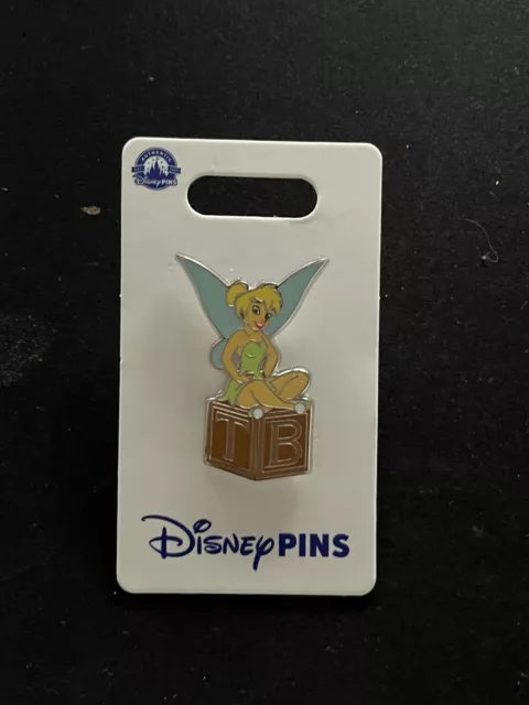 Disney Parks Bastlerglocke sitzend auf einem TB Block Pin, Peter Pan Glitzerflügel