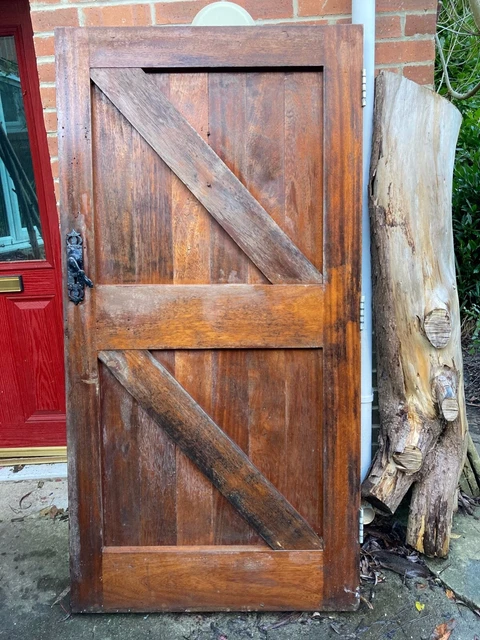 Reclaimed solid Teak external door with original handle and door knocker.