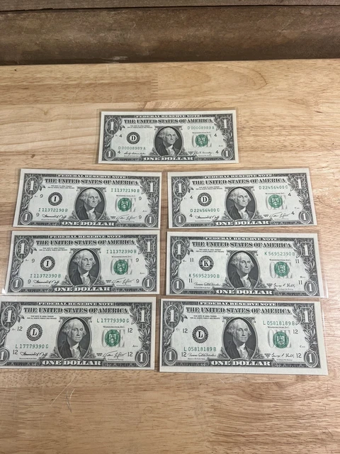 Lot Of 7 Uncirculated Cutting Error $1 Bills Varying Error Size