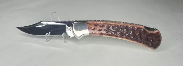 Buck Knives Custom 112 Red Jigged Bone