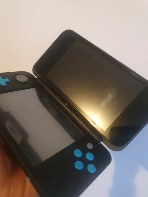 Console New Nintendo 2DS XL - Noire / Turquoise (Ce Coup Tout Seul)