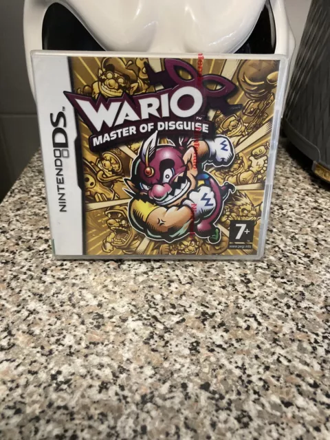 Nintendo DS Wario Master Of Disguise Game Red Strip New & Sealed