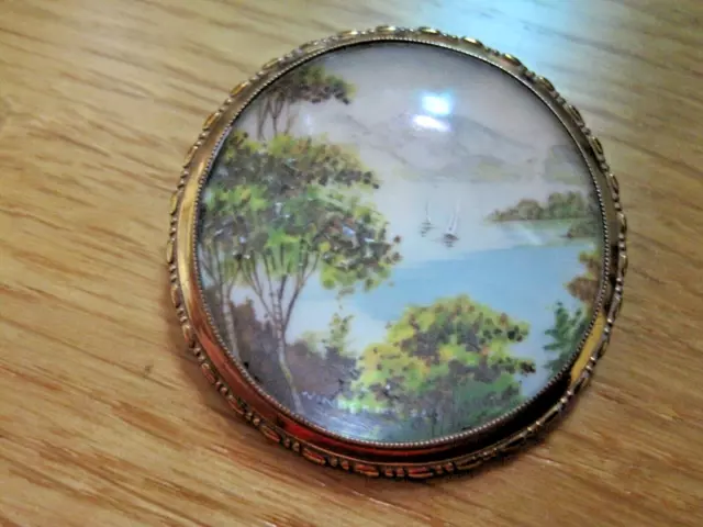 'WINDEMERE' THOMAS L. MOTT HAND PAINTED BROOCH. DATE: c.1930's.