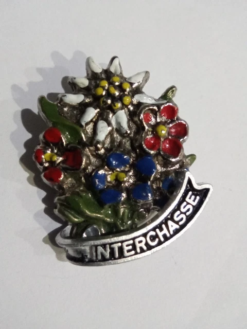 Très jolie broche Cacharel Parfums en métal argenté. Réf A202