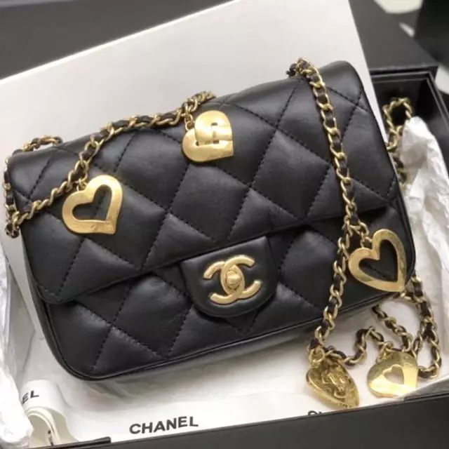 Chanel mini flap bag with heart cc charm, Luxury, Bags & Wallets