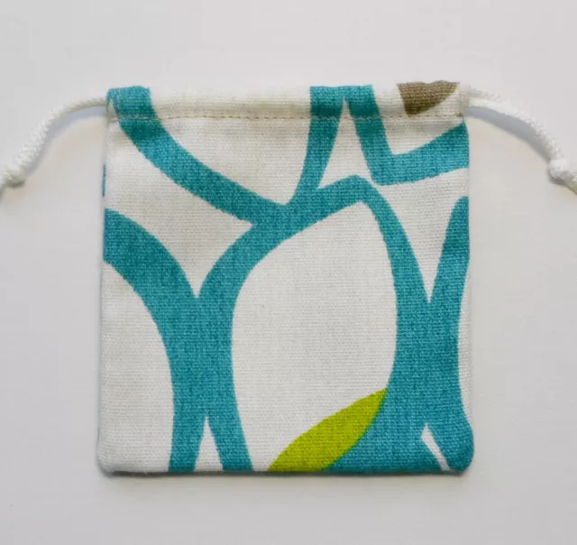 Handmade draw string vegetable bags. Lots of uses. Rescued fabrics. Washable.