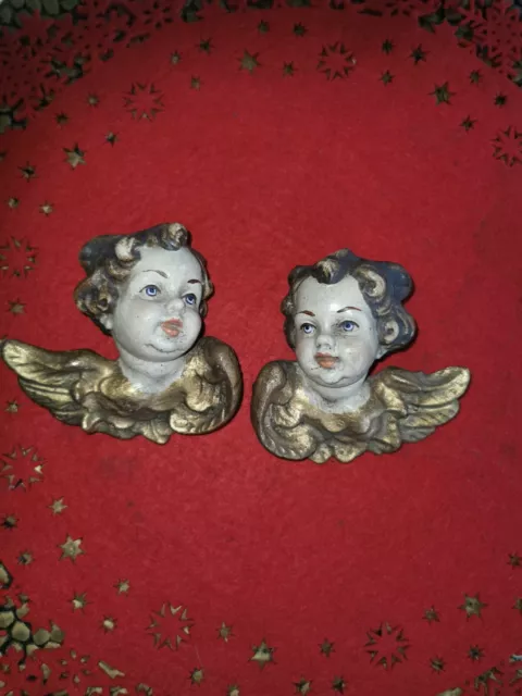 2 Engelköpfe aus Holz sehr alt handbemalt