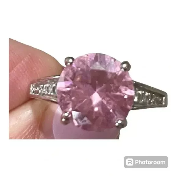 LG. PINK CENTER stone ring w/intricate band that has a stamp (can’t ...