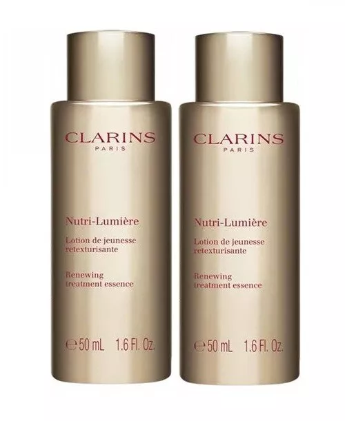 Clarins Nutri-Lumiere Renewing Treatment Essence --200Ml/6.7oz