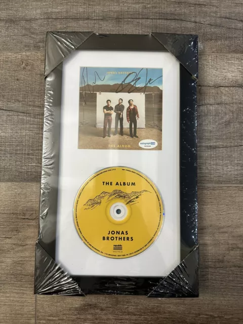 Jonas Brothers Signed Autographed The Album CD 12x7 in Frame w/ COA ALL MEMBERS