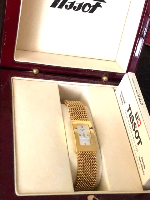 Tissot bellflower hotsell lady 18k gold