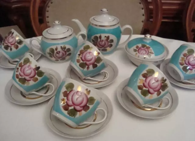 Never used vintage Porcelain Tea set Poinsettia for 6 people