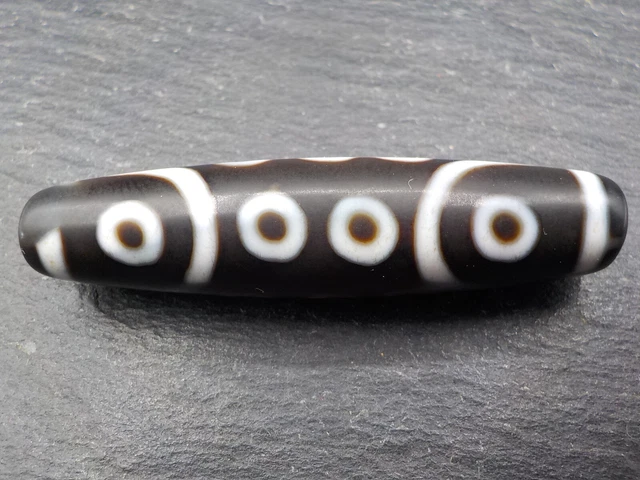 An Agate Dzi bead with a 14 Eye pattern from Tibet / Nepal.