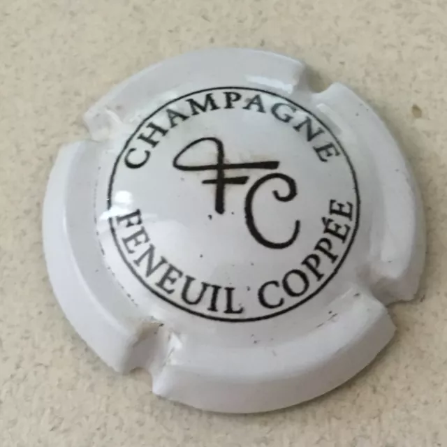 Capsule de champagne FENEUIL-COPPEE (11a. blanc et noir)